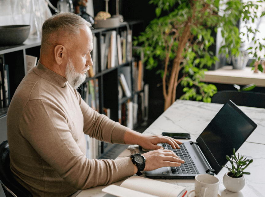 older man on laptop