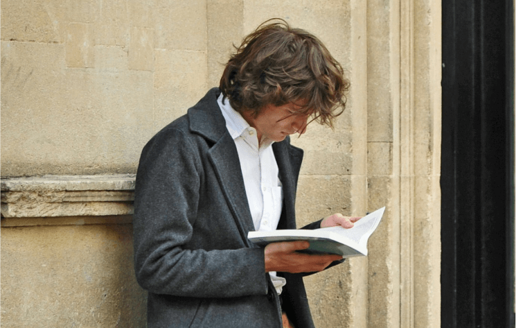 man reading book