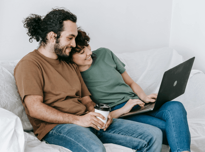 couple looking at laptop