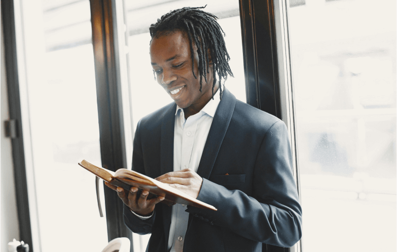 man reading book